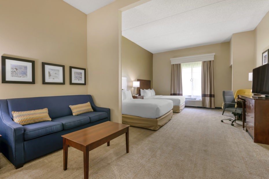 Suite with 2 beds and a sofa bed at Comfort Suites Orlando