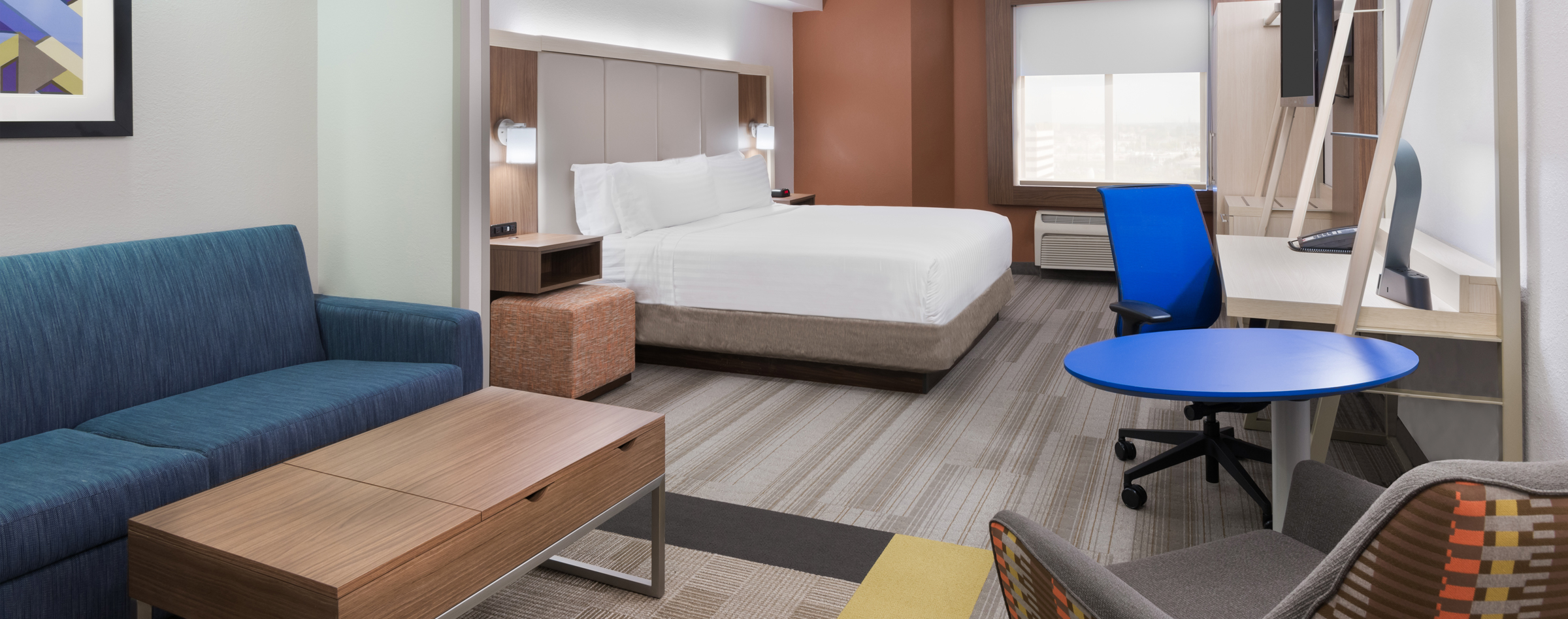King bed and sofa bed suite at Holiday Inn Express & Suites Nearest Universal Orlando